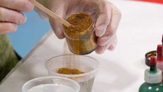 epoxy glitter being mixed