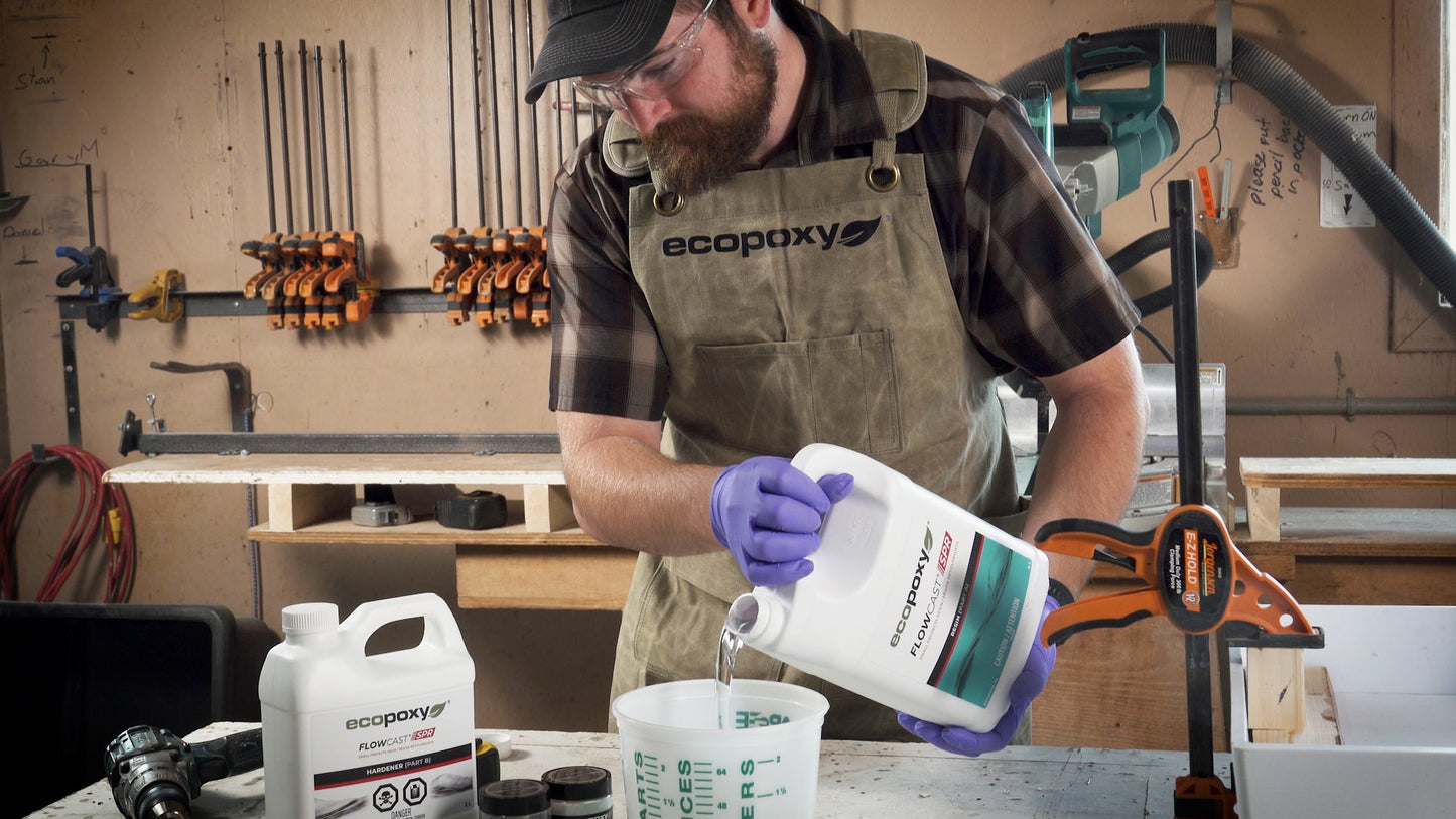 Woodworker mixing epoxy resin for project